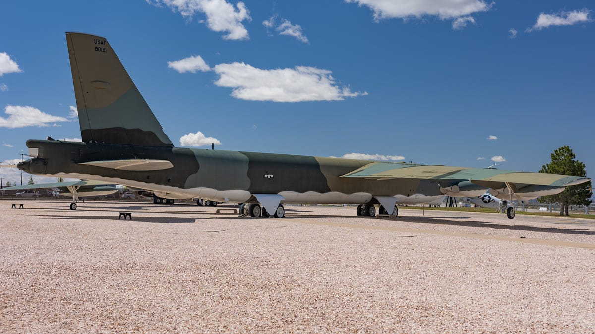A look at the rear right side of a B-52 including the tall tail.