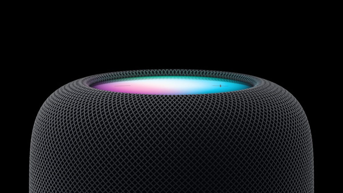 The top of Apple's Gen 2 Homepod speaker against a black background