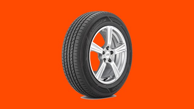 Hankook Kinergy ST tire shown on an orange background