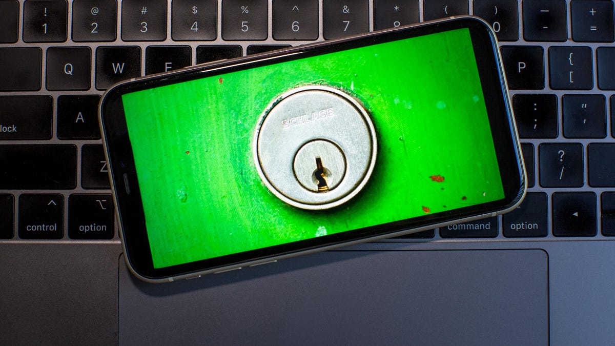 smartphone with a keyhole to symbolize a lock