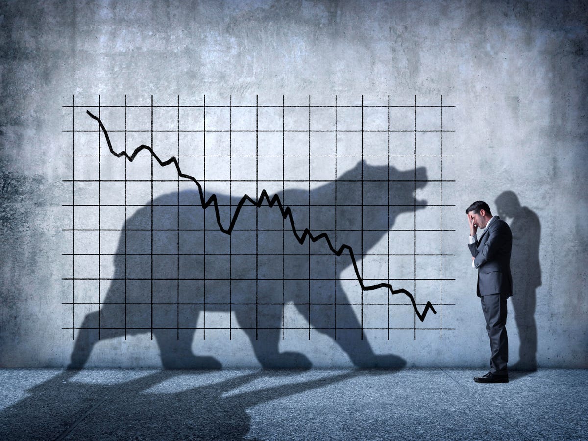 Stock broker faces shadow a bear