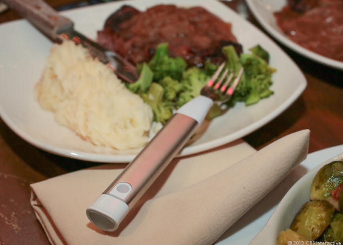 Hapifork on a plate with food and a napkin