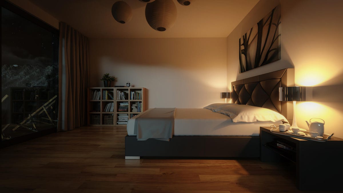 Dark and cozy bedroom with subtle lighting