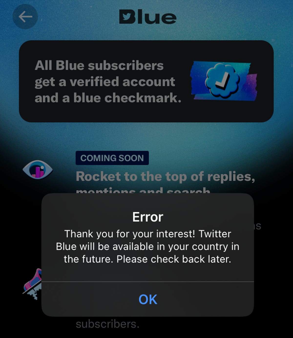 A Twitter Blue error against a blue and black background on an iOS version of the app