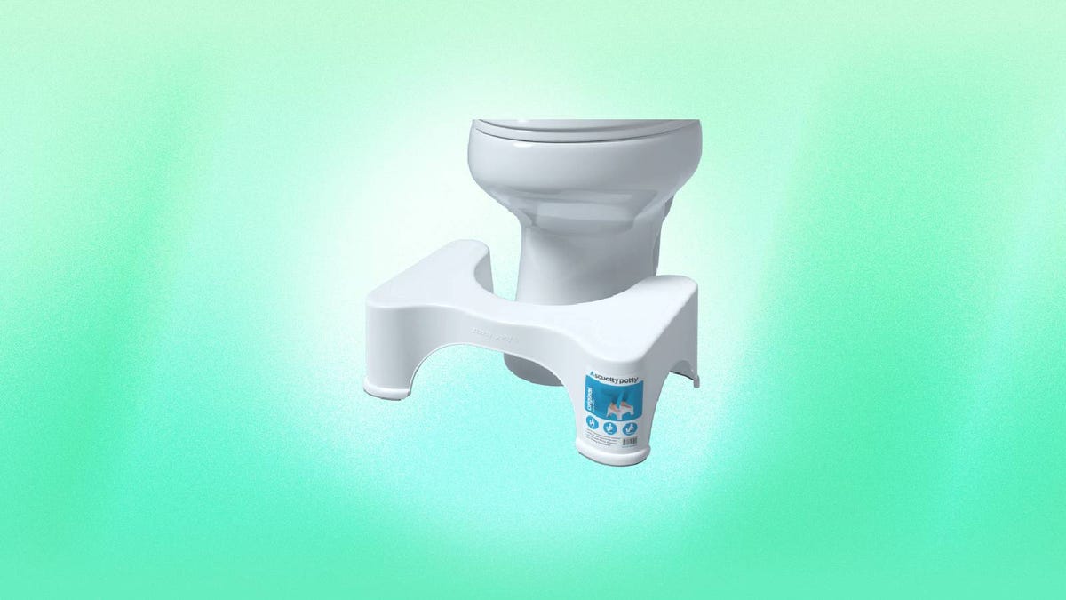 A Squatty Potty stool and toilet against a green background.