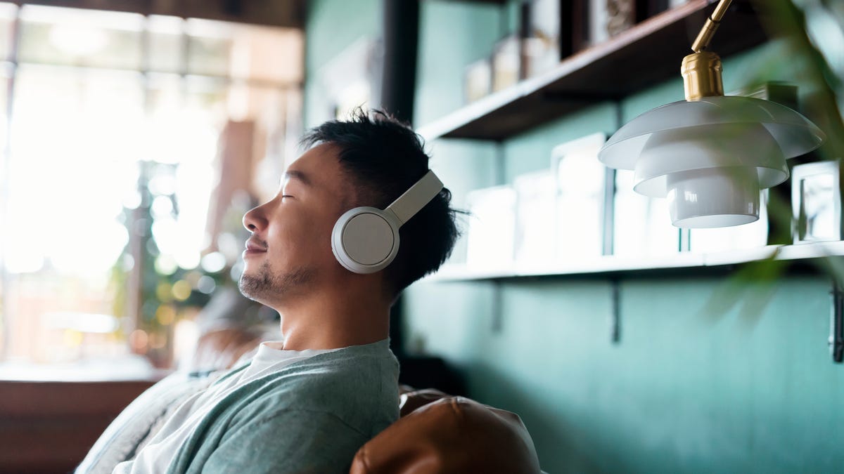 Man listening to audio and resting