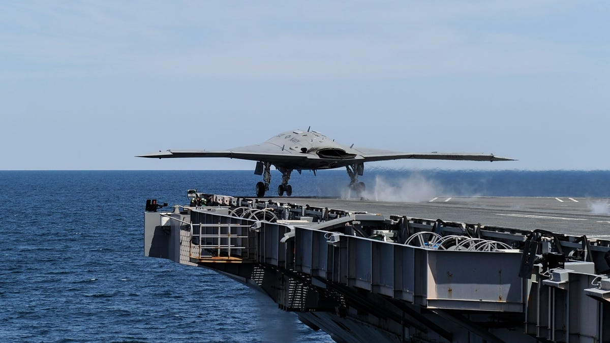 X-47B makes catapult launch from USS George H.W. Bush
