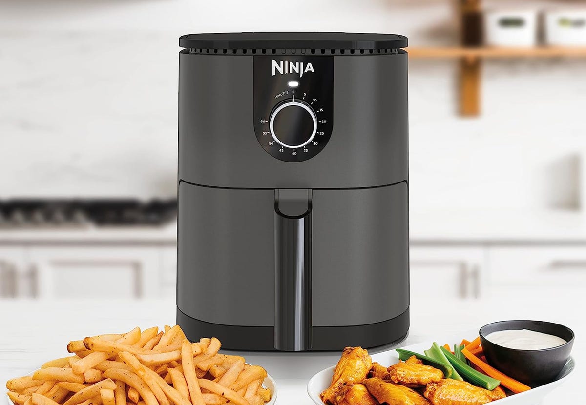 ninja air fryer with fries and wings