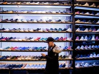 <p>BERLIN, GERMANY - MARCH 31: Shoes are seen at "Overkill" sneakers store on March 31, 2017 in Berlin, Germany during sale of New KAWS x Air Jordan IV sneakers. Several dozen die-hard sneakers fans have taken five days out of their lives to put their names on a list and maintain their presence in order to buy the limited-production shoes. 50 pairs went on sale on March 31 at Overkill, one of only three stores in Germany to sell the shoes. At EUR 350 a pair the shoes carry a hefty price tag, but many of the buyers will resell them, for prices they predict could reach EUR 4,000. Sportswear companies like Adidas and Nike have hired famous designers for limited-production sneakers as the appetite for the shoes by sneakers fanatics has grown into a niche market over the last few years.</p>