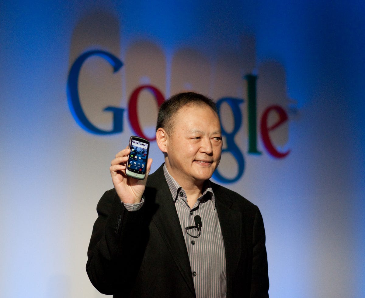 Peter Chou, CEO of HTC, holds up the phone.