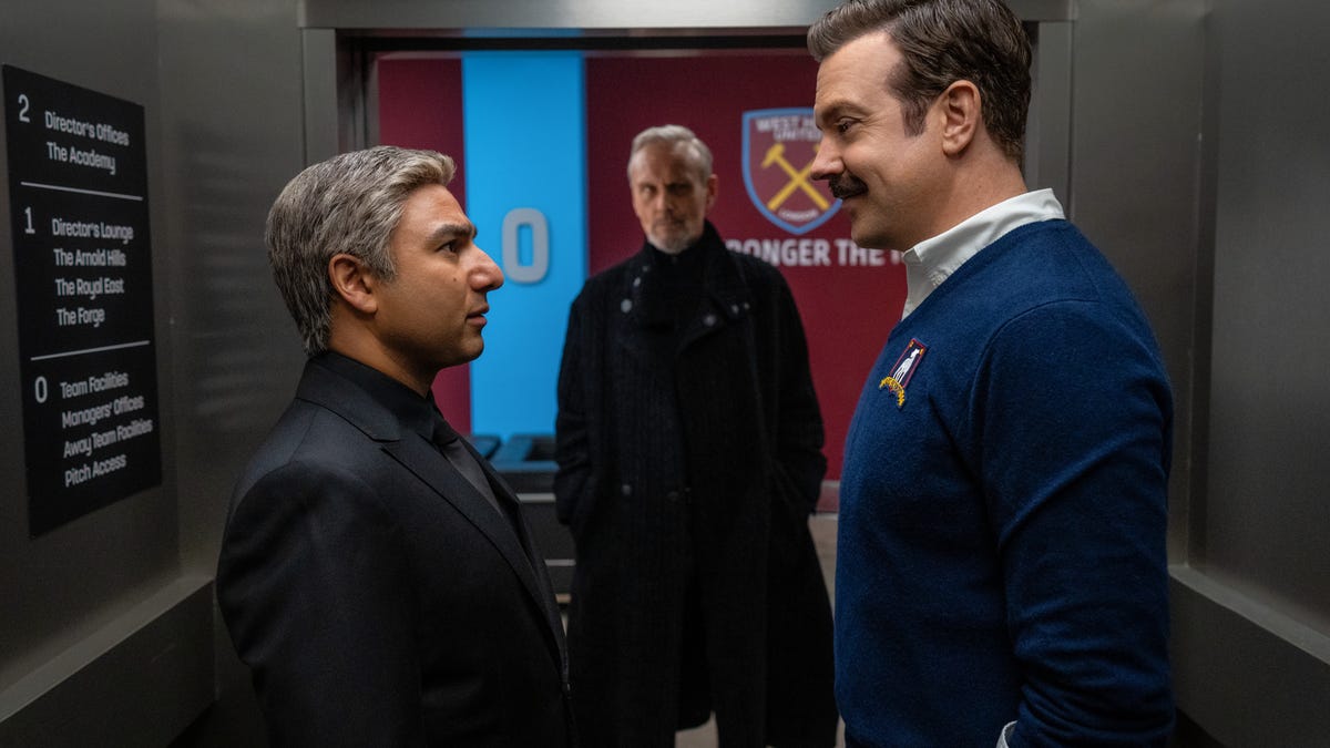 Nick Mohammed and Jason Sudeikis stand face to face in new image from Ted Lasso, season 3. Anthony Head looks on
