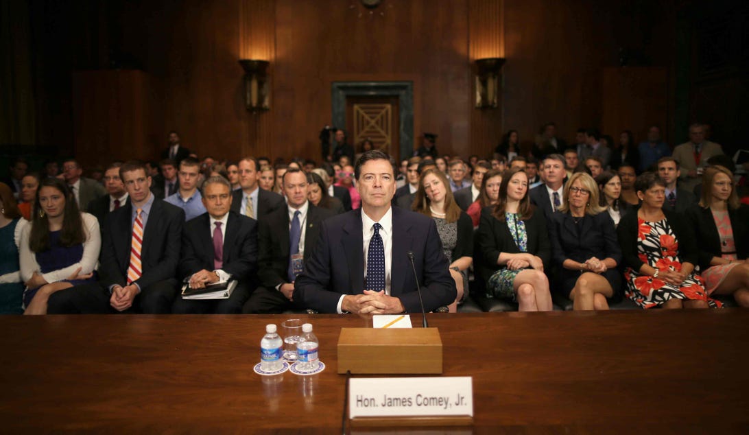 James Comey prepares for his Senate Judiciary Committee confirmation hearing in July on Capitol Hill. He was confirmed as the new FBI director this week.