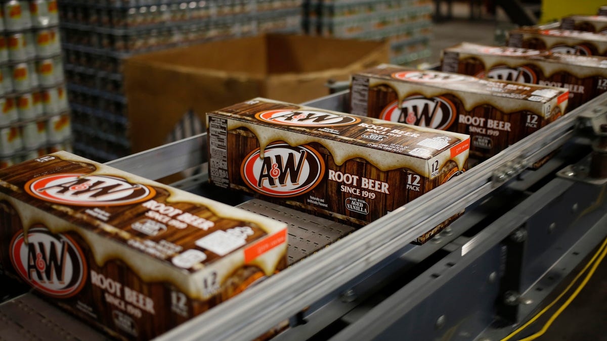photo of A&W root beer cans on a shelf