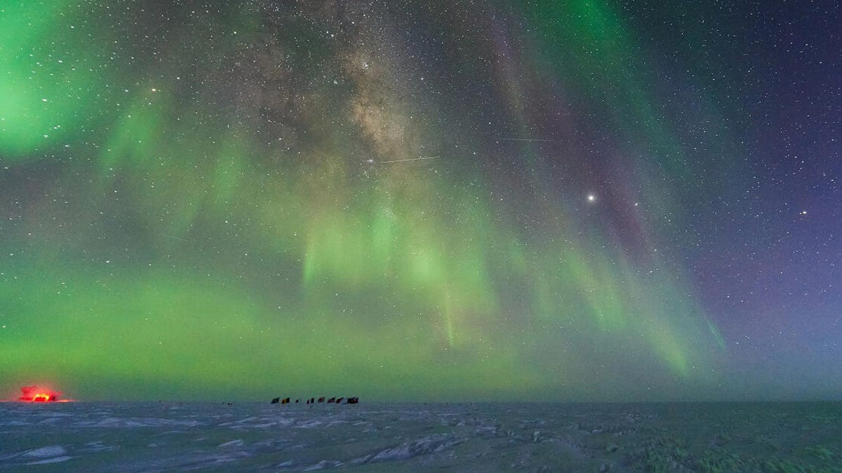 Aurora and stars, as seen from the US Amundsen-Scott South Pole Station in July 2020