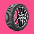 Continental ExtremeContact Sport tire shown on a pink background