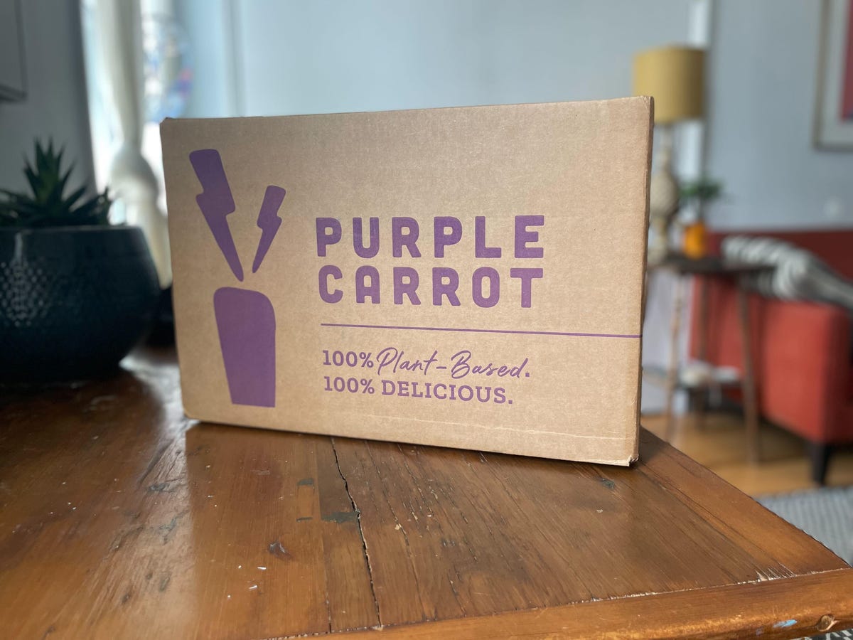 purple carrot box on table