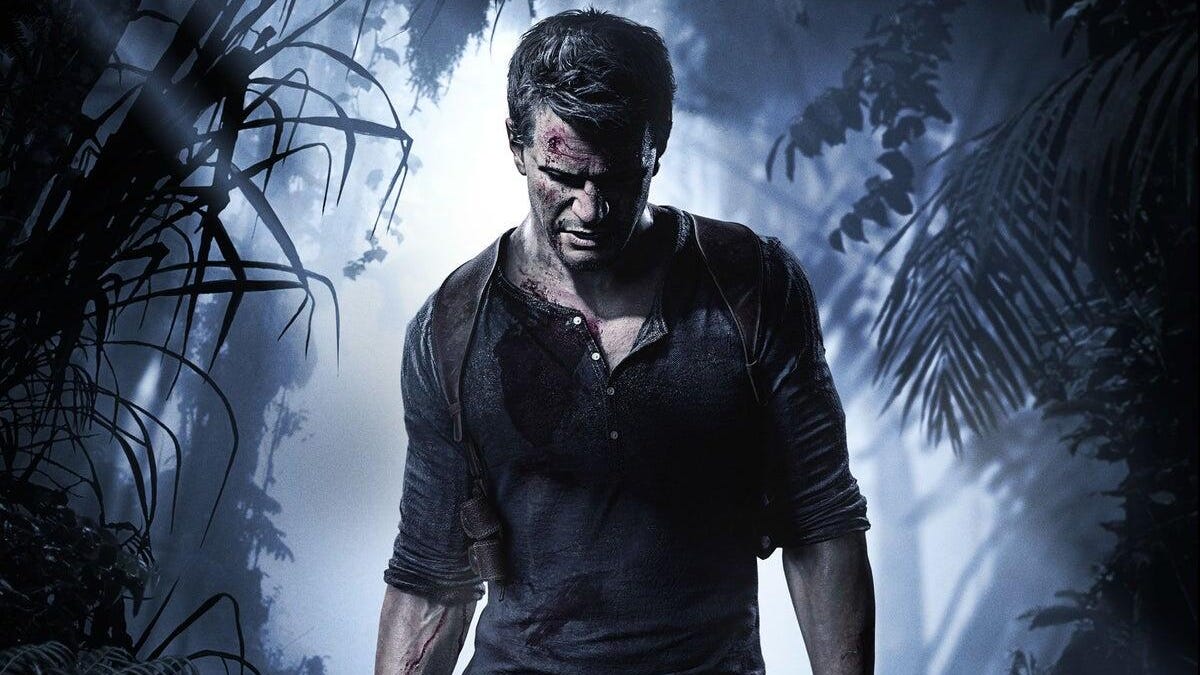 Nathan Drake with head down and sleeves rolled up in a jungle scene