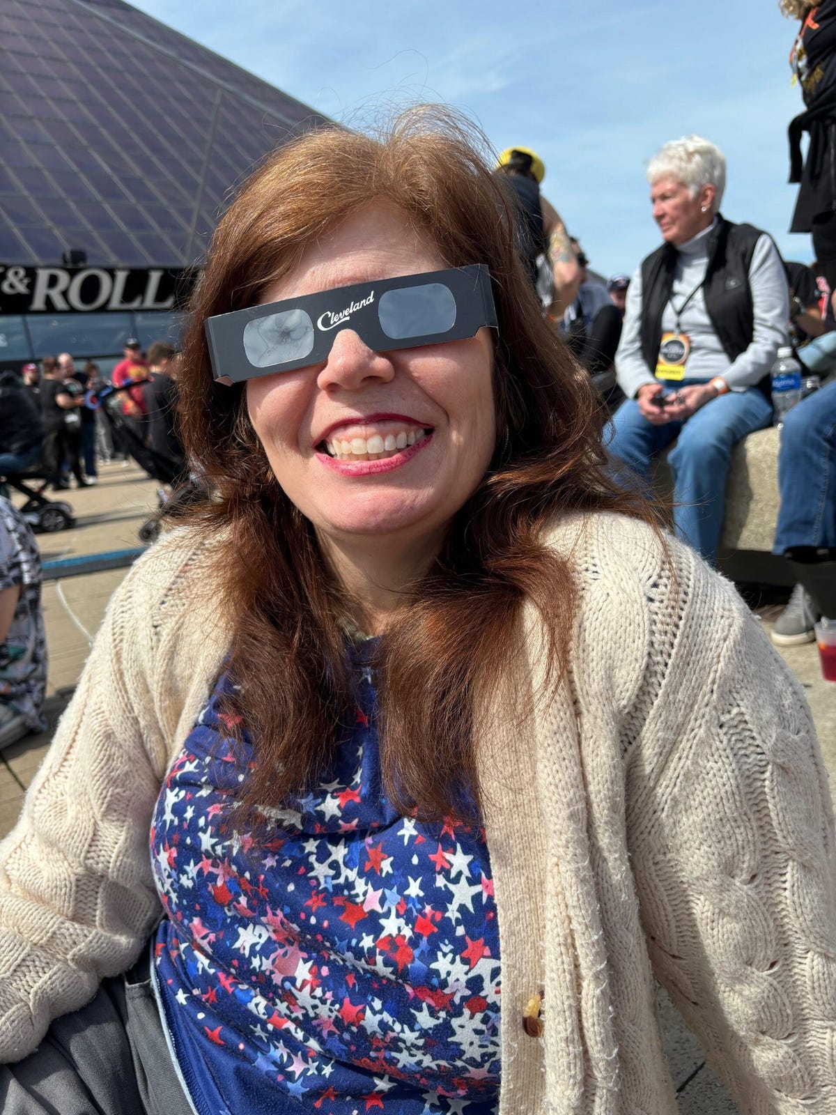 Author at the Rock and Roll Hall of Fame in Cleveland, wearing eclipse glasses
