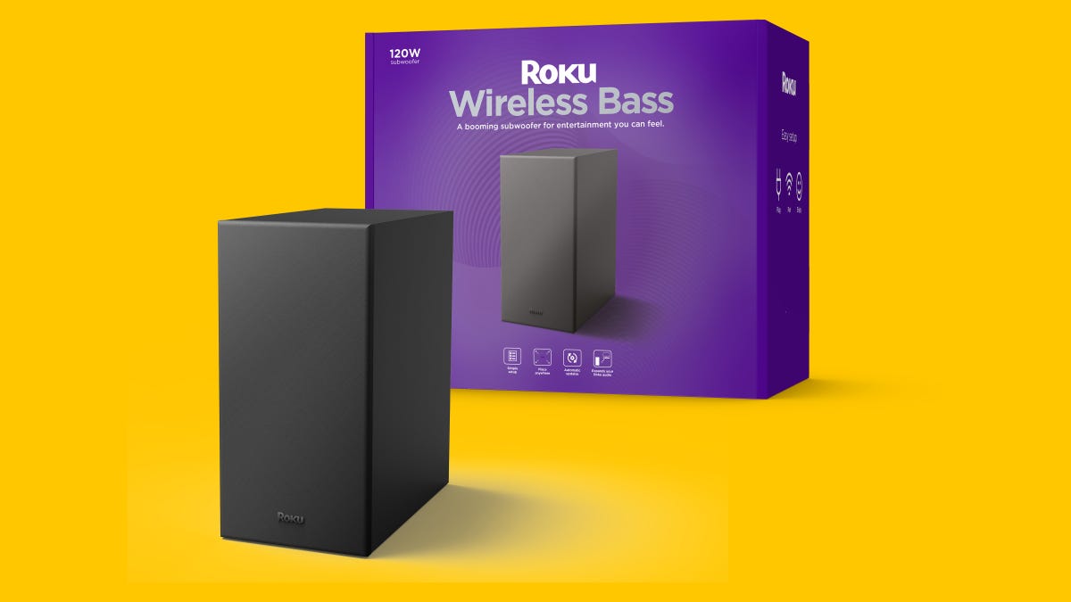 The Roku Wireless Bass subwoofer in front of its case.