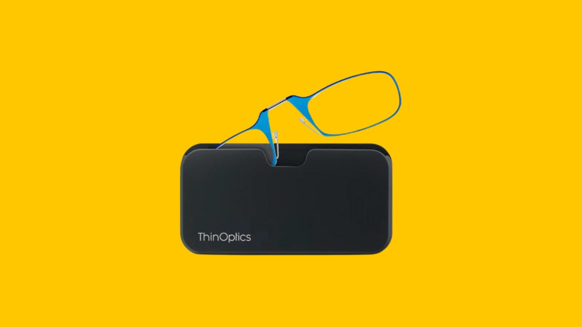 A pair of ThinOptics readers is pictured sliding into the black universal pod case against a yellow background.