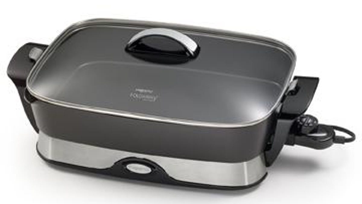 When not in use, the electric skillet transforms for storage.