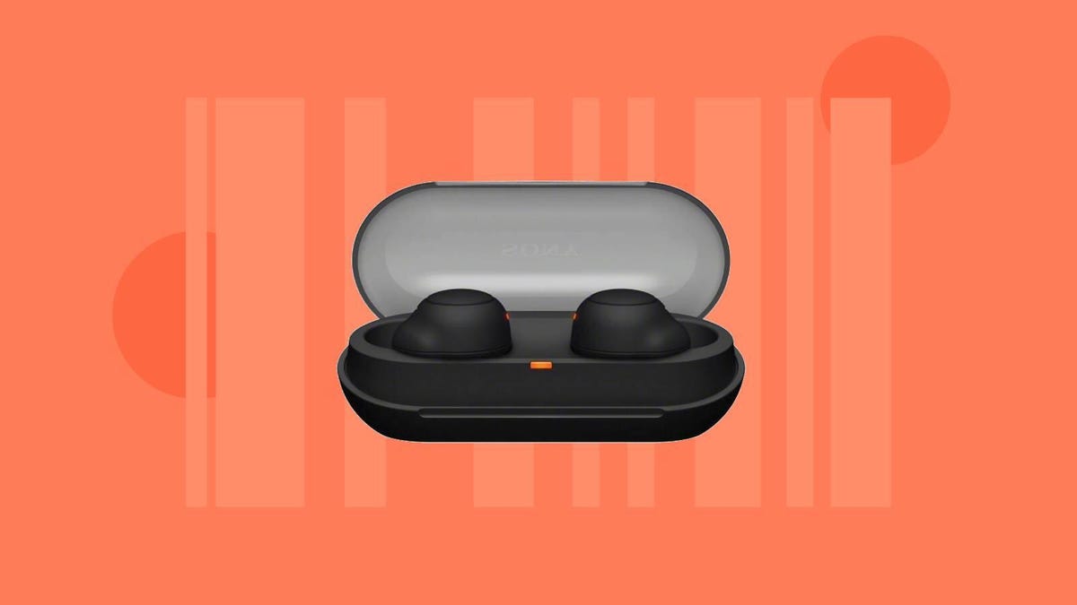 A pair of black Sony earbuds in the charging case against an orange background.