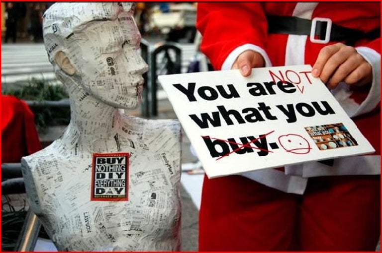 Followers of Buy Nothing Day blame unchecked consumerism for ecological woes, psychological depression, and the economic crisis.