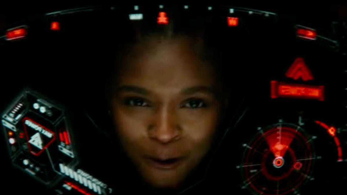 Dominique Thorne in an Iron Man-like suit in a trailer for Black Panther 2.