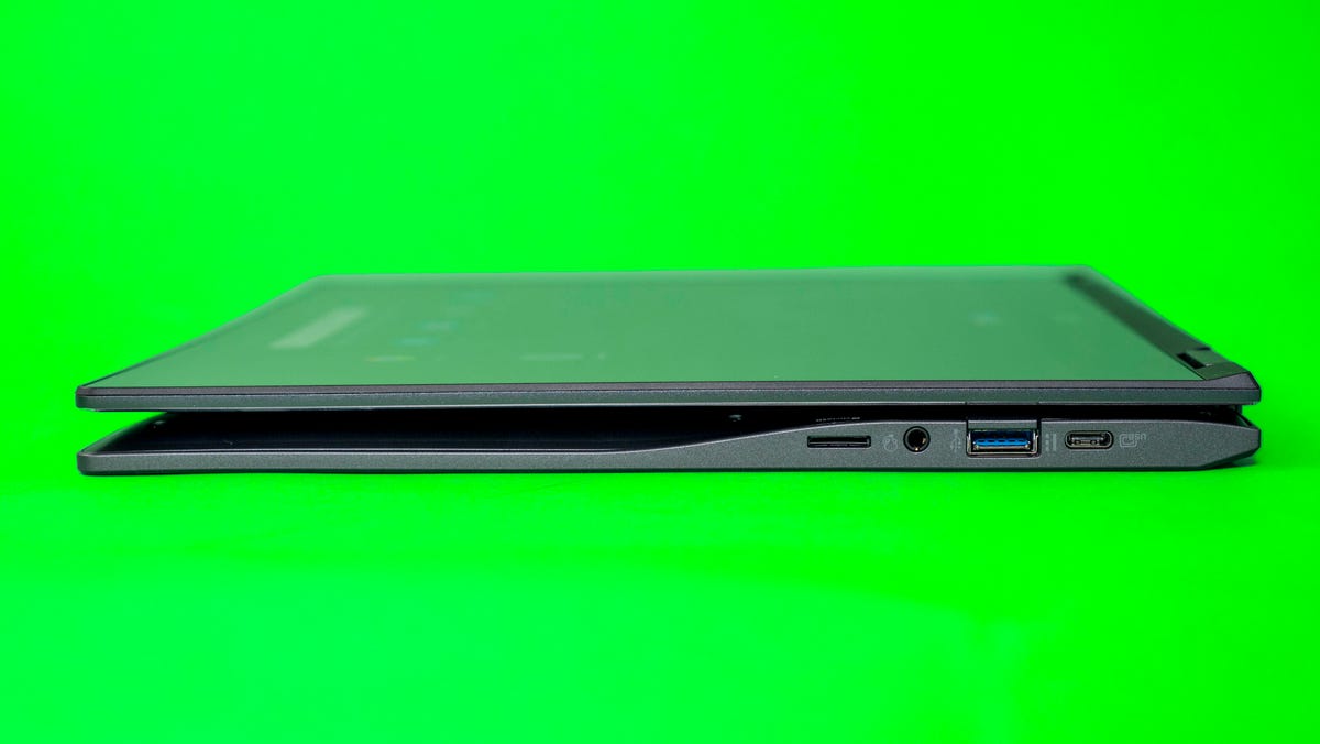 Acer Chromebook Spin 513 on a green background