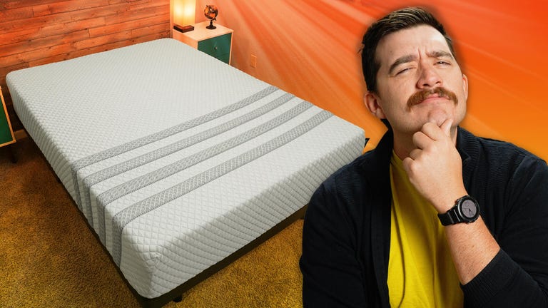 The Leesa Sapira mattress with a bed against a colorful background and a man in a sweater in the front.
