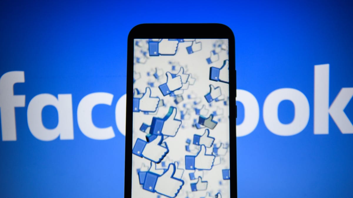 Facebook likes logo are seen on an android mobile phone