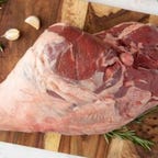 leg of lamb on cutting board
