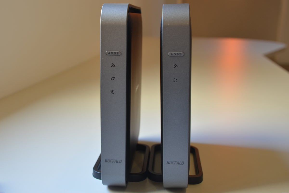The Buffalo WZR-D1800H router (left) and the Buffalo WLI-H4-D1300 media bridge -- currently the only two 802.11ac devices on the market -- look almost the same from the front...