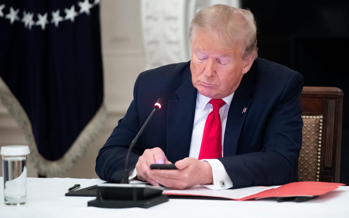 Donald Trump using smartphone