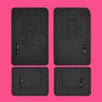 Husky Liners Uni-Fit All Weather Floor Mats on a pink background