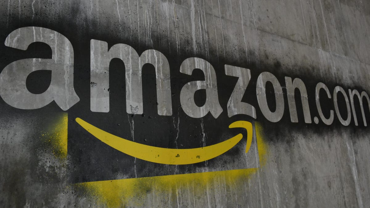 Amazon.com logo painted on a concrete wall.