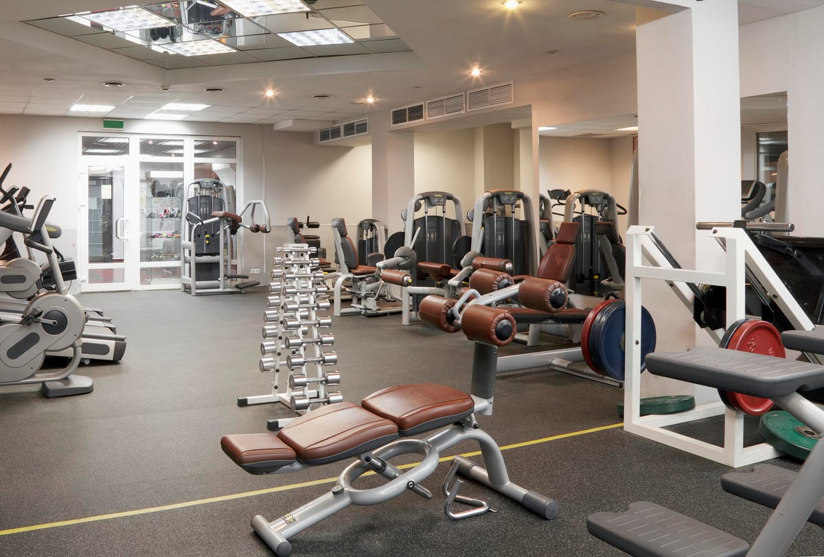 An empty fitness club with equipment.