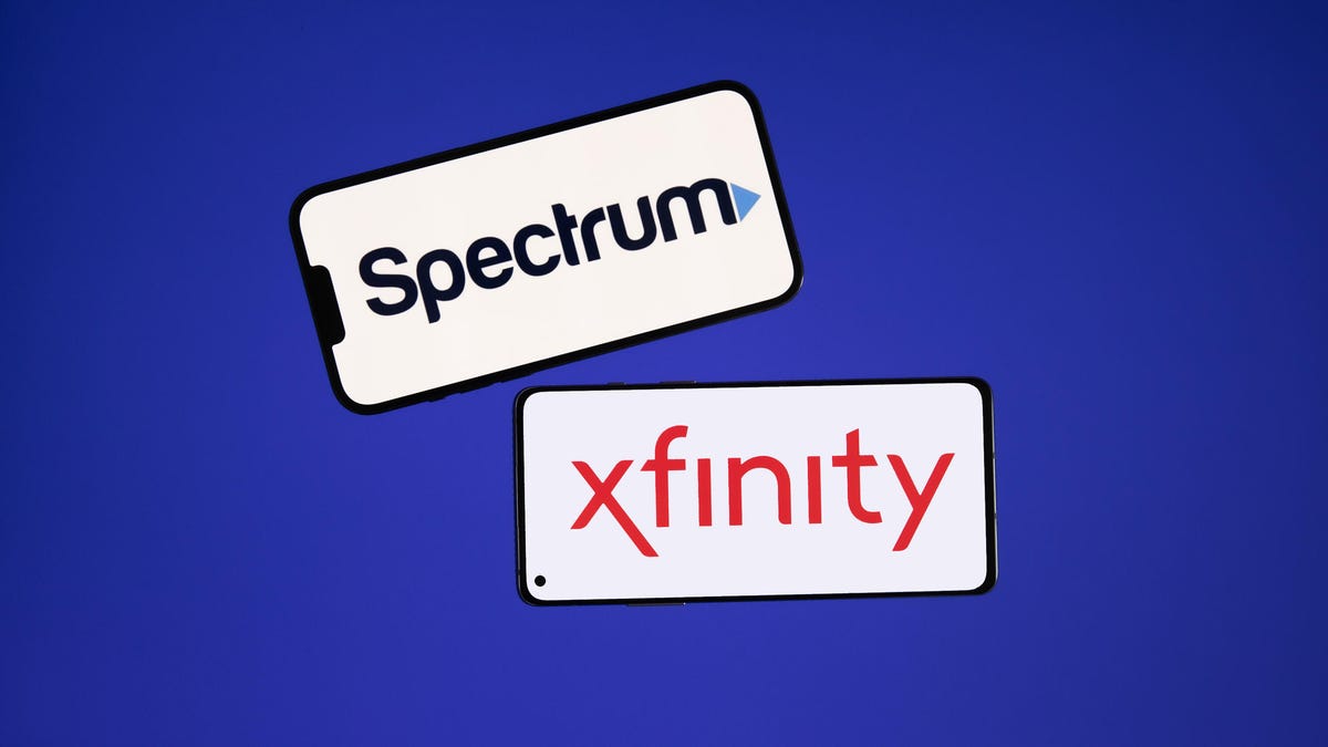 Spectrum and Xfinity logos on phones