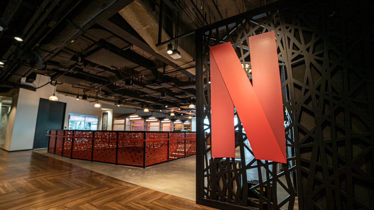 A shot of Netflix's Singapore office, with a large Netflix logo in the foreground.