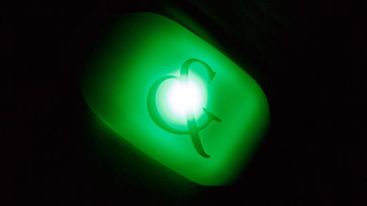 Studio XO's wrist-mounted emtion sensors glow green when a person's emotions go beyond calm.