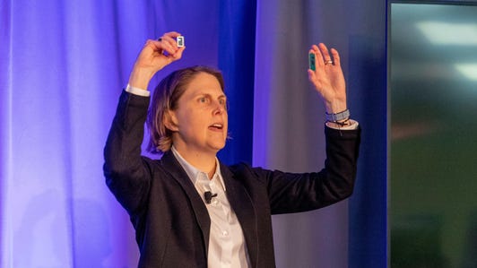 Becky Loop, Intel's chief client architect, shows two 10nm Ice Lake processors for laptops.