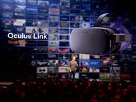 <p>Mark Zuckerberg, in front of an image of an Oculus VR controller.</p>