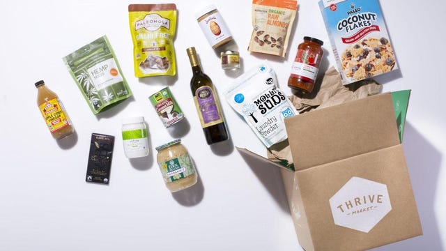 Open Thrive Market box with various foods