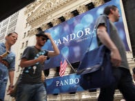 NEW YORK, NY - JUNE 15:  A banner for Pandora Media Inc., the online-radio company, hangs in front of the New York Stock Exchange walk on its first day of trading as a public company on June 15, 2011 in New York City. Pandora stock rose as much as 63 percent to $26 following its debut on the New York Stock Exchange, under the symbol P. Reversing much of the previous day's gains, stocks fell Wednesday as more news emerged about the fragility of the American and global economy. The Dow Jones Industrial Average fell 88 points, or 0.8%, to 11987 in morning trading.  (Photo by Spencer Platt/Getty Images)