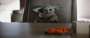 See Baby Yoda Snatch a Space M&M in New 'Mandalorian' Preview thumbnail