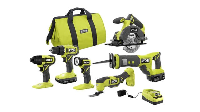 Six power tools from Ryobi, a battery, a charger and a carrying case are displayed against a white background.