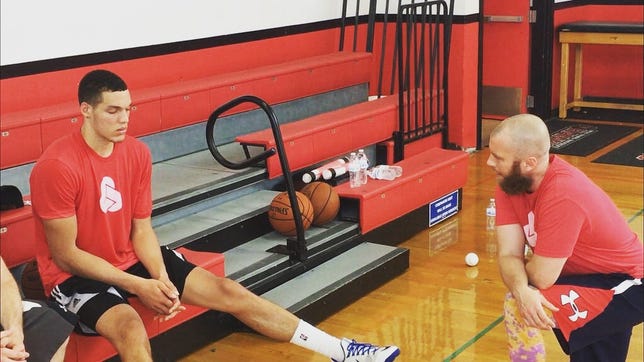 NBA star Aaron Gordon, left, goes through a meditation session with his mental-skills coach Graham Betchart.