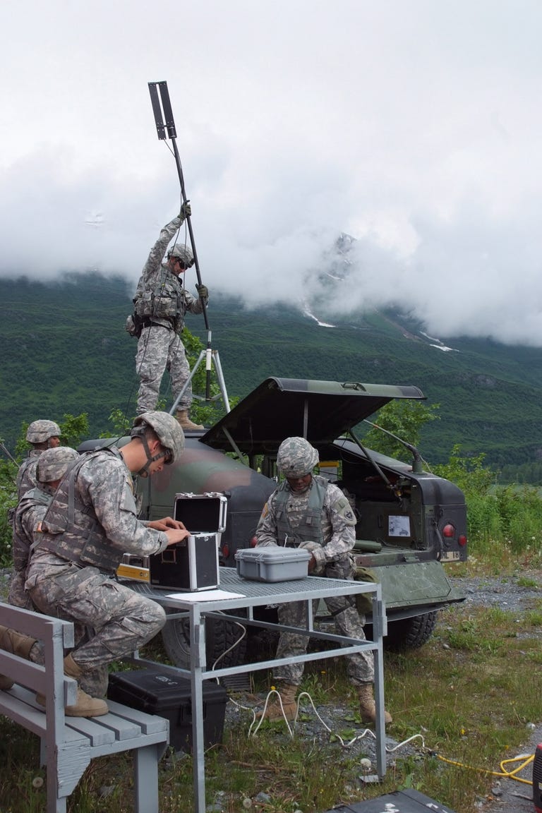 Soldiers from the 95th Chemical Company set up a robot control station.