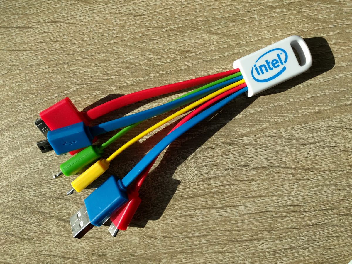 A multicolored computer dongle featuring an assortment of cable types.