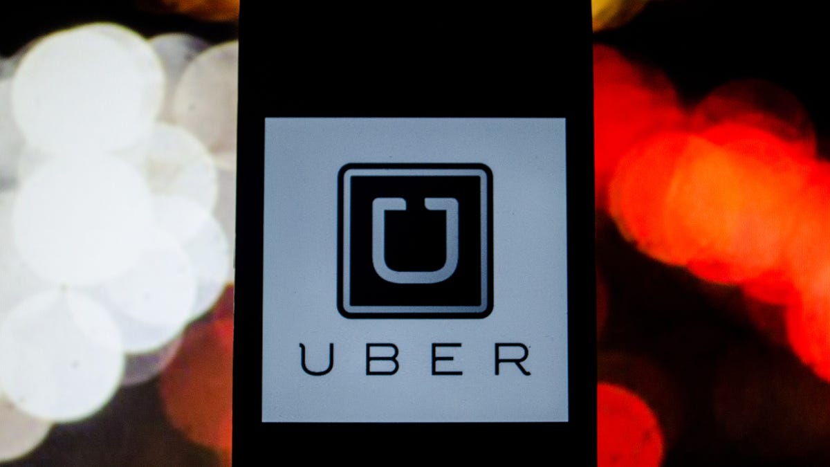 Uber logo on a smartphone.